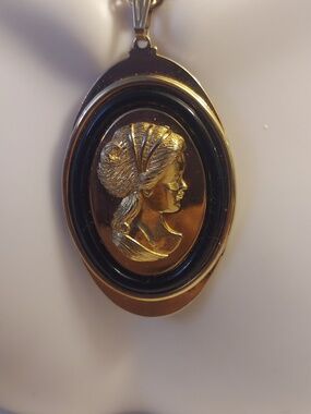 Black and gold cameo pendant